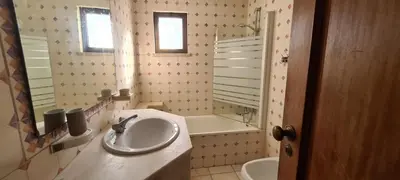 a bathroom with a sink and a toilet and a tub at 402 - Oura - 2 Bedroomed Apartment - Sea View in Albufeira