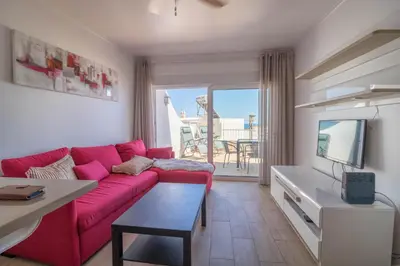 a balcony with a view of the ocean from a house at #044 T1 Rossio by Home Holidays in Albufeira