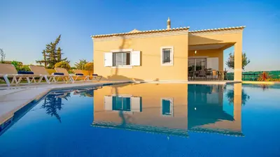 an aerial view of a city with a red sign at Villa Palms by Algarve Vacation in Albufeira