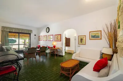 a living room with a couch and a table at WHome | Balaia 3-Bed Family Holiday Villa in Olhos de Água