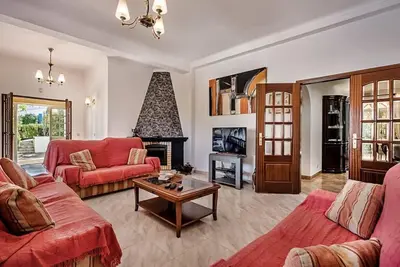 an aerial view of a villa with a swimming pool at Villa Cabrita, Superb location, large villa, walk to restaurants, supermarkets beach in Guia