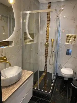 a bathroom with a shower and a sink at AL Barbinha in Faro