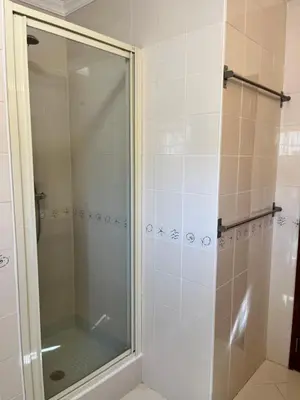a shower with a glass door in a bathroom at Villa Nox in Brejos