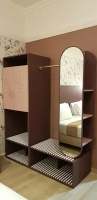 a bedroom with a bed and a mirror at Happy House Comfort Plus in Faro