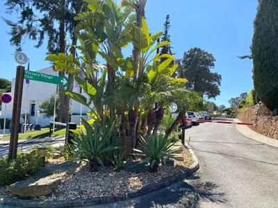 a street sign on the side of a road at Victory Village Quinta do Lago - Spacious 2 Bed / 3 Bath Apartment in Almancil