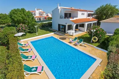an aerial view of a villa with a swimming pool at Villa Jorge by Villa Plus in Albufeira