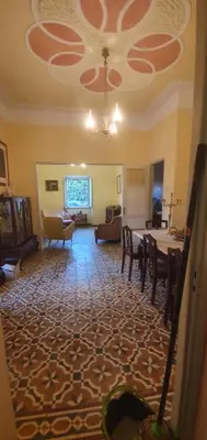 a kitchen with a sink and shelves with dishes at Villa Rosa Boutique in Almancil