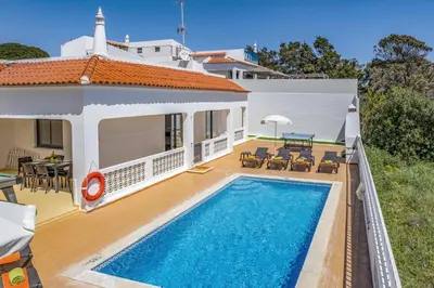 an image of a villa with a swimming pool at Villa Marrachinho by Villa Plus in Albufeira