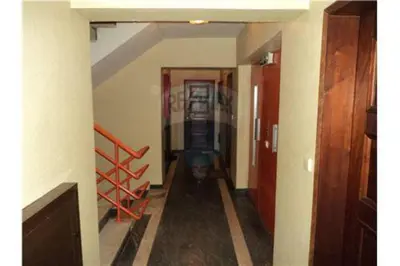 a hallway with a staircase in a house at Quarteira 1-Bed Sleeps 4 Parking 1 min to Beach in Quarteira