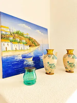 a view of a beach with buildings and the ocean at Sea & Sun WindMill Apartment by Be Cherish in Albufeira