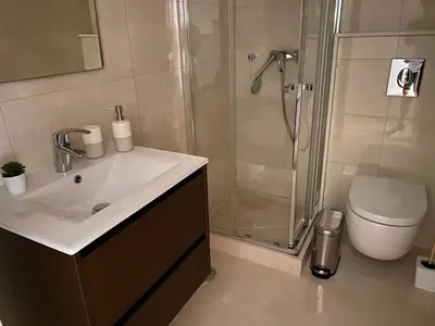 a bathroom with a sink and a shower at Wonderful View - Quinta da Colina C8 in Albufeira