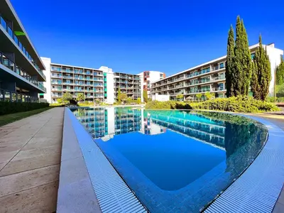 a large swimming pool in front of a building at Residence Golf Club Vilamoura by Be Cherish in Quarteira