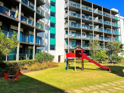 a large swimming pool in front of a building at Residence Golf Club Vilamoura by Be Cherish in Quarteira