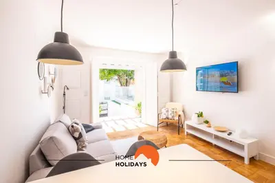 a living room with a couch and a table at #049 Villa Lemon by Home Holidays in Albufeira