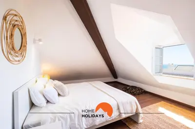 a bedroom with a bed with a large window at #049 Villa Lemon by Home Holidays in Albufeira