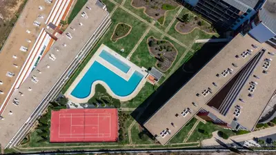 an overhead view of a building with a swimming pool at RESIDENCE GOLF CLUB by Intiholidays in Vilamoura