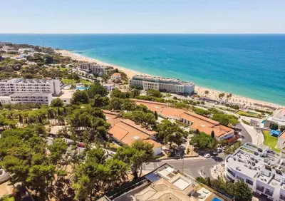 an aerial view of a beach and the ocean at Central Town 2-Bedroom Apartment Albufeira in Albufeira