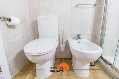 a bathroom with a toilet and a sink at #057 T1 Rossio 43D by Home Holidays in Albufeira