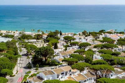 an aerial view of a resort with the ocean in the background at Casa Alessa - Vale de Lobo in Almancil