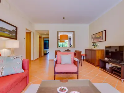a living room with a couch and a table at AL - Apartamento Vila Sol F5 L in Vilamoura