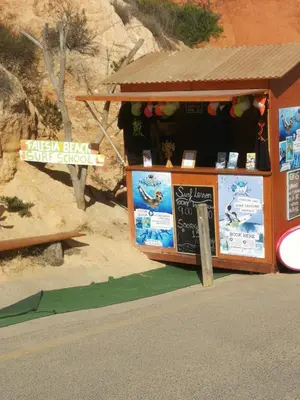 a food stand with a sign on the side of the road at Casa do Algarve in Albufeira