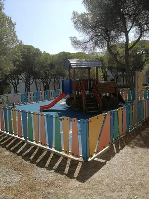 a playground with a train in a park at Casa do Algarve in Albufeira
