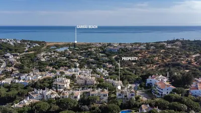 an aerial view of a town with houses and the ocean at Vale de Lobo by Intiholidays in Vale do Lobo