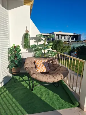 a living room with a couch and a table at Villa Sunshine in Albufeira