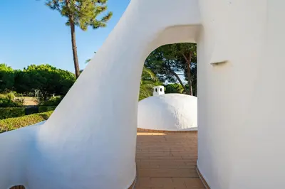 an archway leading to a domed building at Casa de Gales - Vilamoura in Vilamoura