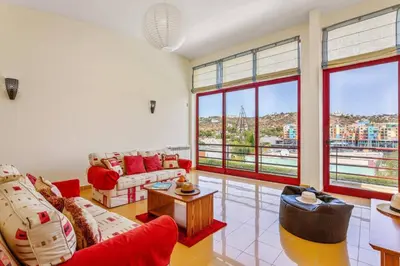 a bathroom with a sink and a tub and a shower at Villa Marina Azul by Villa Plus in Albufeira