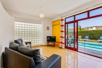 a bathroom with a sink and a shower and a tub at Villa Marina Azul by Villa Plus in Albufeira