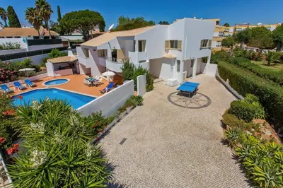 an image of a villa with a swimming pool at Villa Papi by Villa Plus in Albufeira