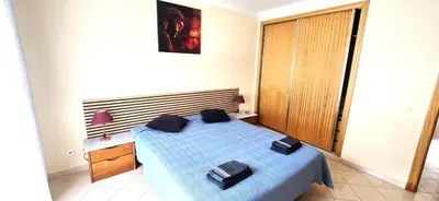 an empty room with a hallway with a ceiling at Holidays - Albufeira in Albufeira
