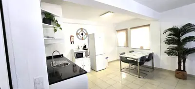 a living room with a couch and a table at Historic Centre B - Albufeira in Albufeira