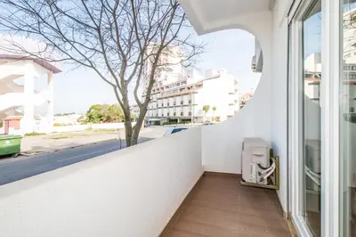 a balcony with a view of a street at Bambu Villa in Albufeira