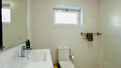 a small room with two beds and a window at Vital by Check-in Portugal in Albufeira