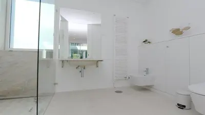 a white bathroom with a sink and a toilet at Villa Terese-CleverDetails, Central Vilamoura, Sleeps 6, luxury, walking distance in Vilamoura