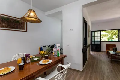 a kitchen with a table with plates of food on it at The Albufeira Concierge - Villa Balaia Sun Terrace in Albufeira