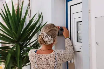 a woman with a flower mask on her head at Old Fisherman's Corner 18 - Centro Old Town Albufeira in Albufeira
