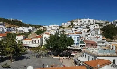 a city with a bunch of white buildings at Terrace apartament on the Sea in Albufeira