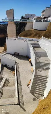a building under construction with stairs on the ground at AlbufeiraSun, arrive as a guest leave as a friend. in Albufeira