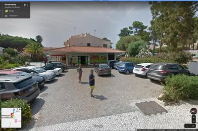 a group of cars parked in a parking lot at 2 Bed apartment with Roof Top Pool, close to Falesia Beach AT10 in Albufeira