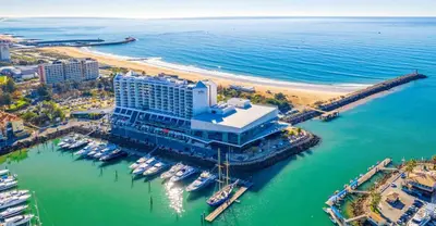 an aerial view of a resort on a beach at Vilamoura Main Avenue by Homing in Vilamoura