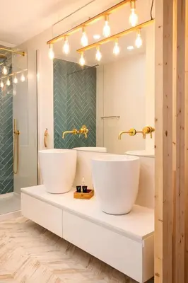 a bathroom with a tub and a sink at Mamma Mia CITY CENTER in Vilamoura