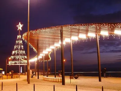 a christmas tree on a pier with lights at Sunset View Apartment - 22 in Albufeira
