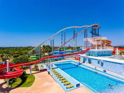 a water park with a roller coaster and a pool at Albufeira - Apartment - Sleeps 4 - Pool - Seaside in Albufeira