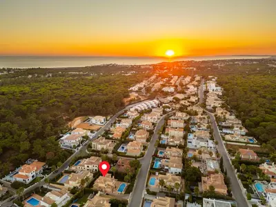 an aerial view of a city at sunset at Villa Dalia by Algarve Vacation in Almancil