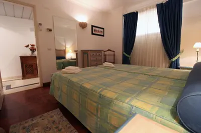 a bedroom with a large bed and a mirror at Marina Mar Sea Breeze by SAPvillas in Vilamoura