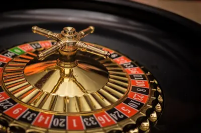 a close up of a roulette wheel on a table at Centralgarve - Great, Bright 2-bedroom Flat in the Center of Vilamoura -Topázio in Vilamoura