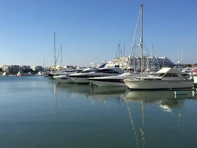 a group of boats docked in a harbor at Centralgarve - Great, Bright 2-bedroom Flat in the Center of Vilamoura -Topázio in Vilamoura